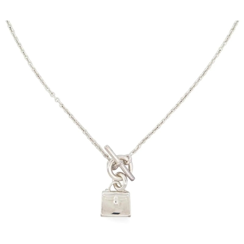 Hermès Mittellange Halskette NEUE HERMES KETTE PENDANT AMULETTEN KELLY TASCHEN  silber
