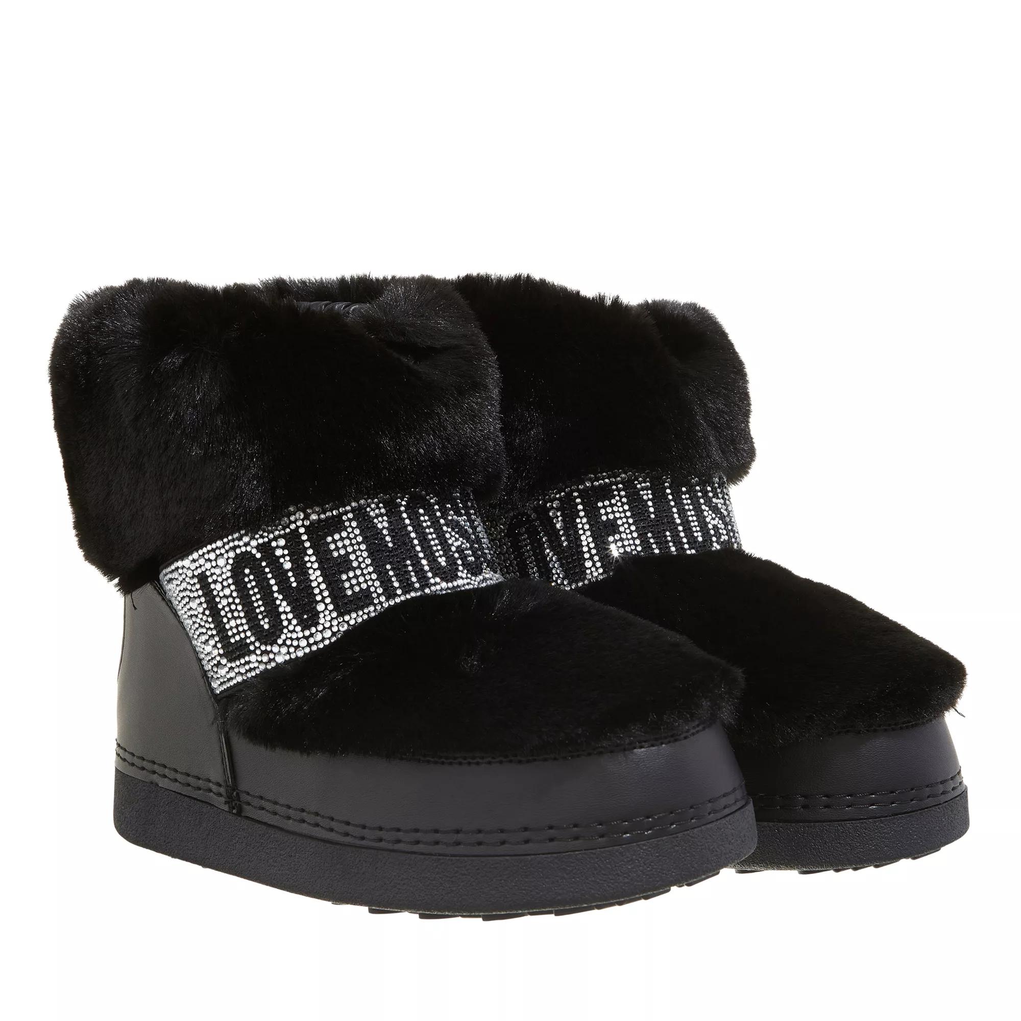 Boots moschino clearance