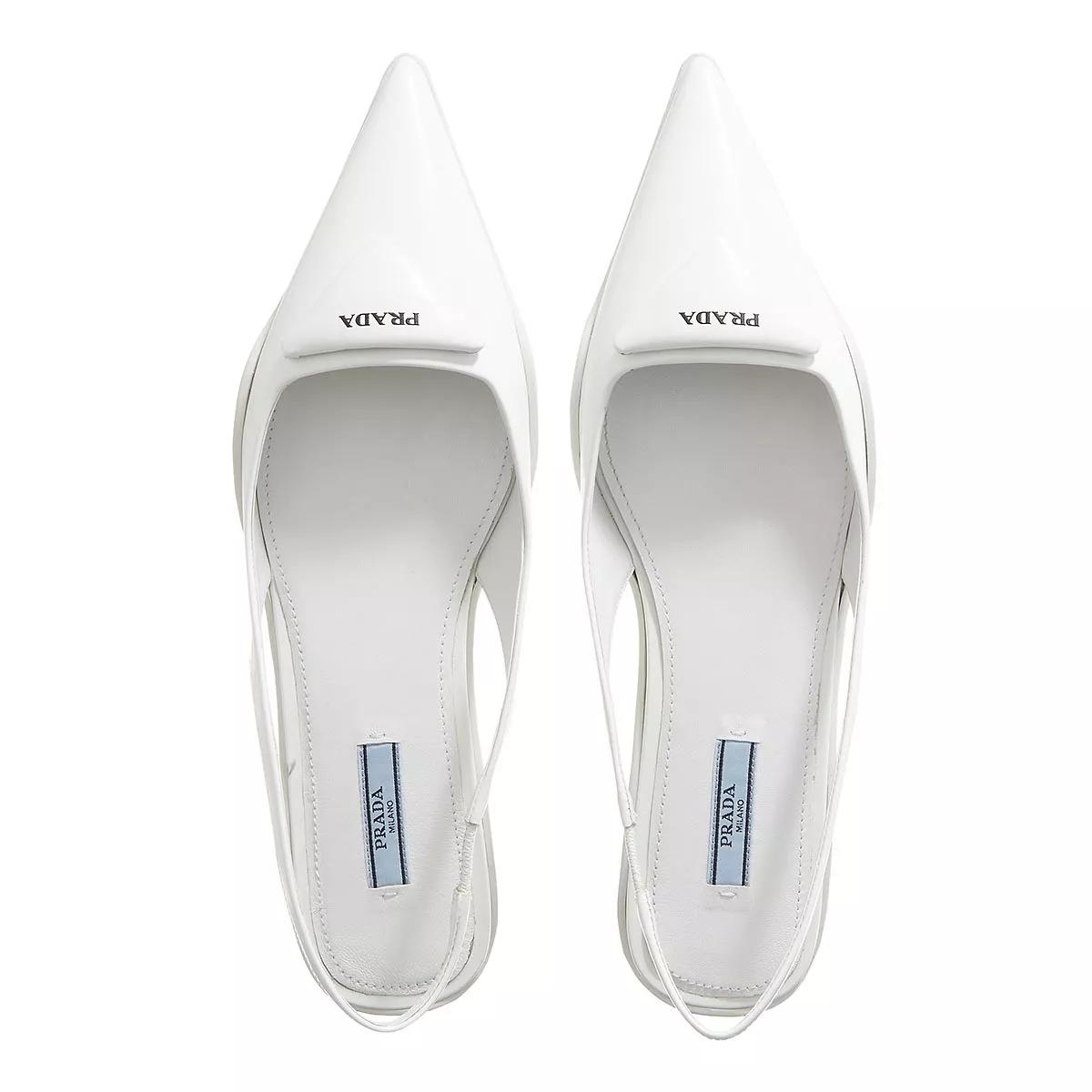 White prada hot sale mules