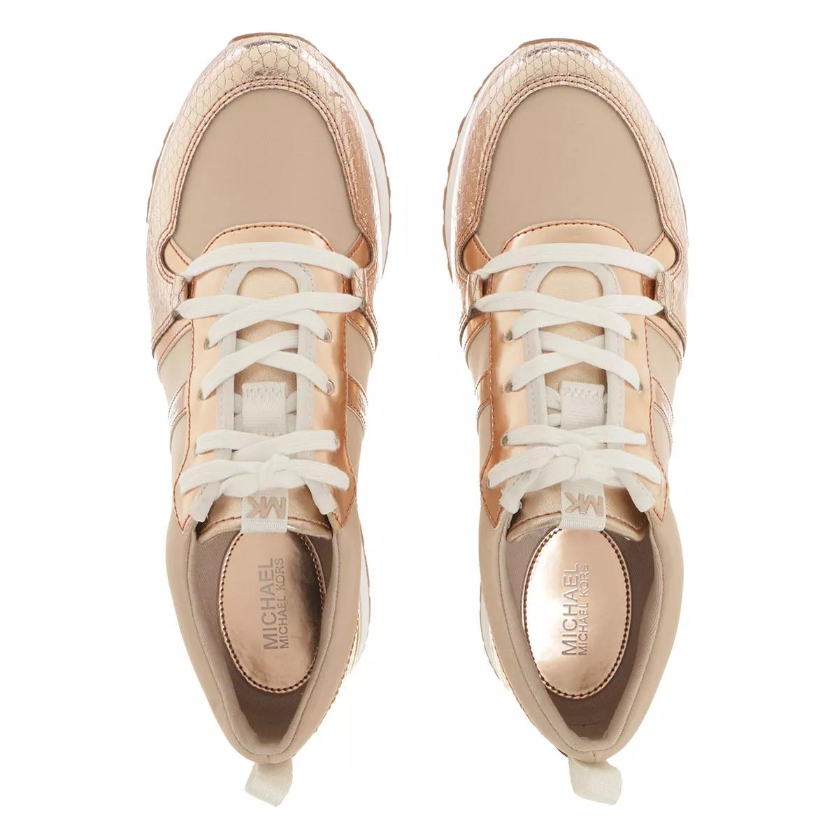 Michael kors rose hot sale gold slip on sneakers