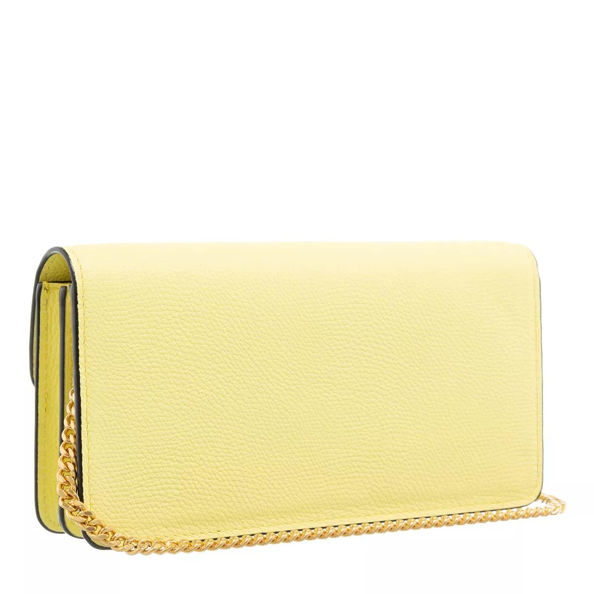 Pale yellow hot sale clutch bag