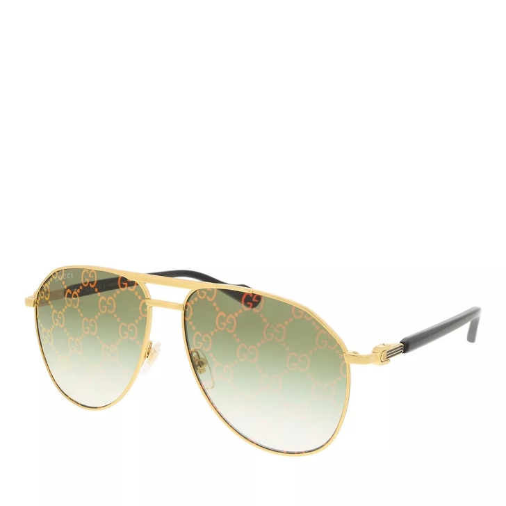 Gucci gold and store green sunglasses