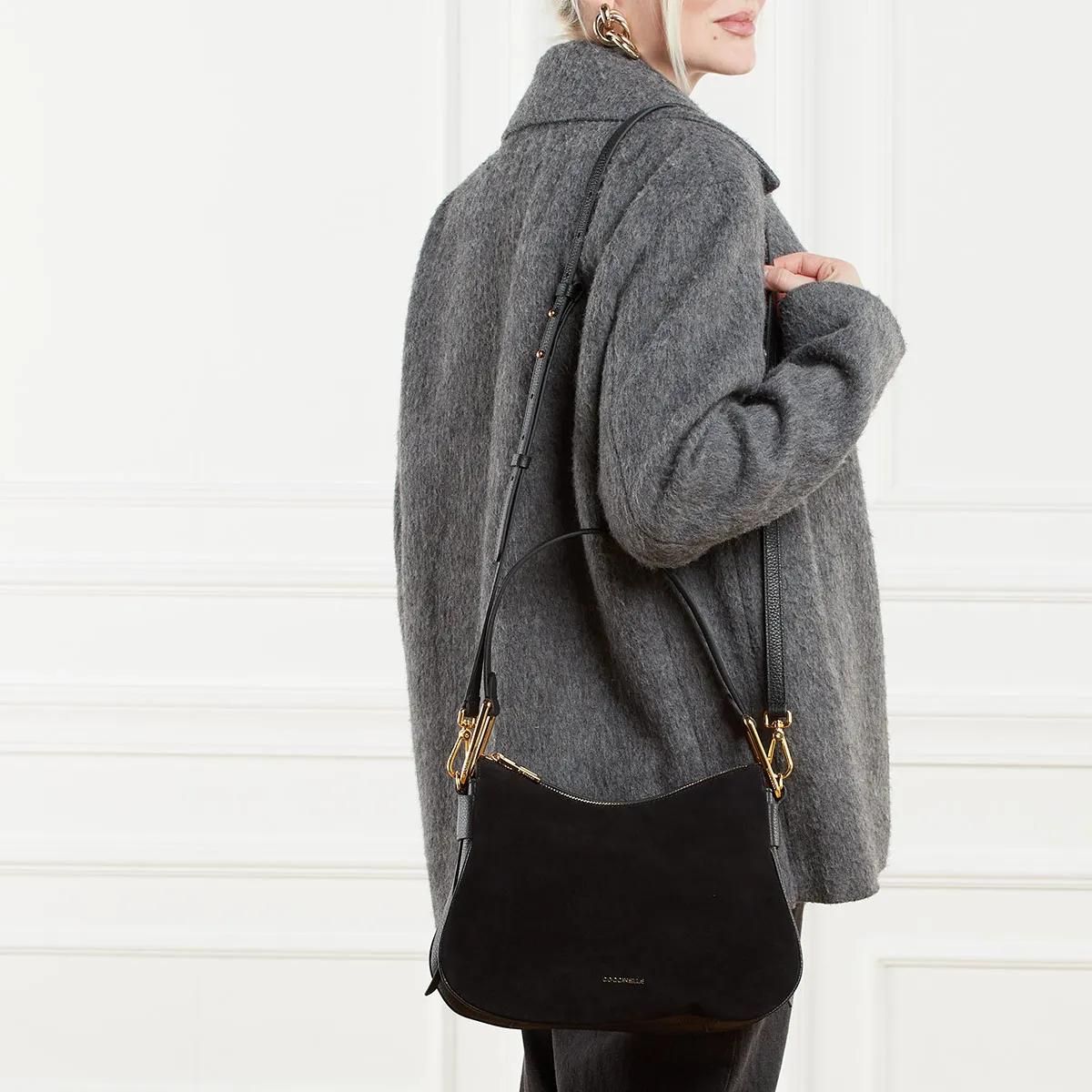 Coccinelle Hobo bags magie Suede Bim in zwart