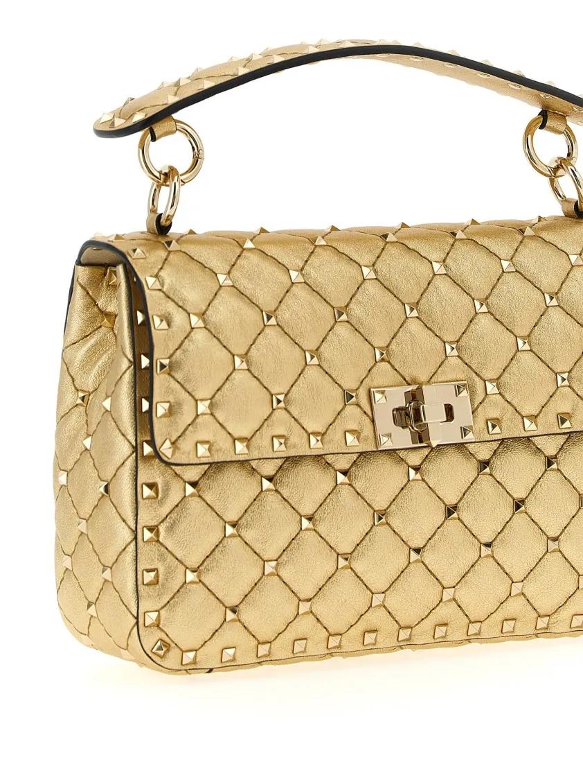 Valentino Garavani Hobo bags Rockstudspike' M Shoulder Bag in goud
