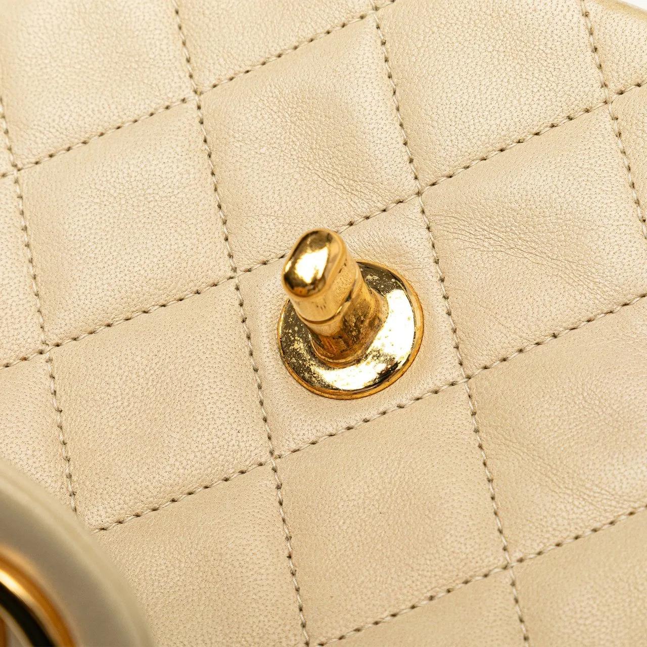 Chanel Hobo bags Mini Square Classic Lambskin Single Flap in bruin