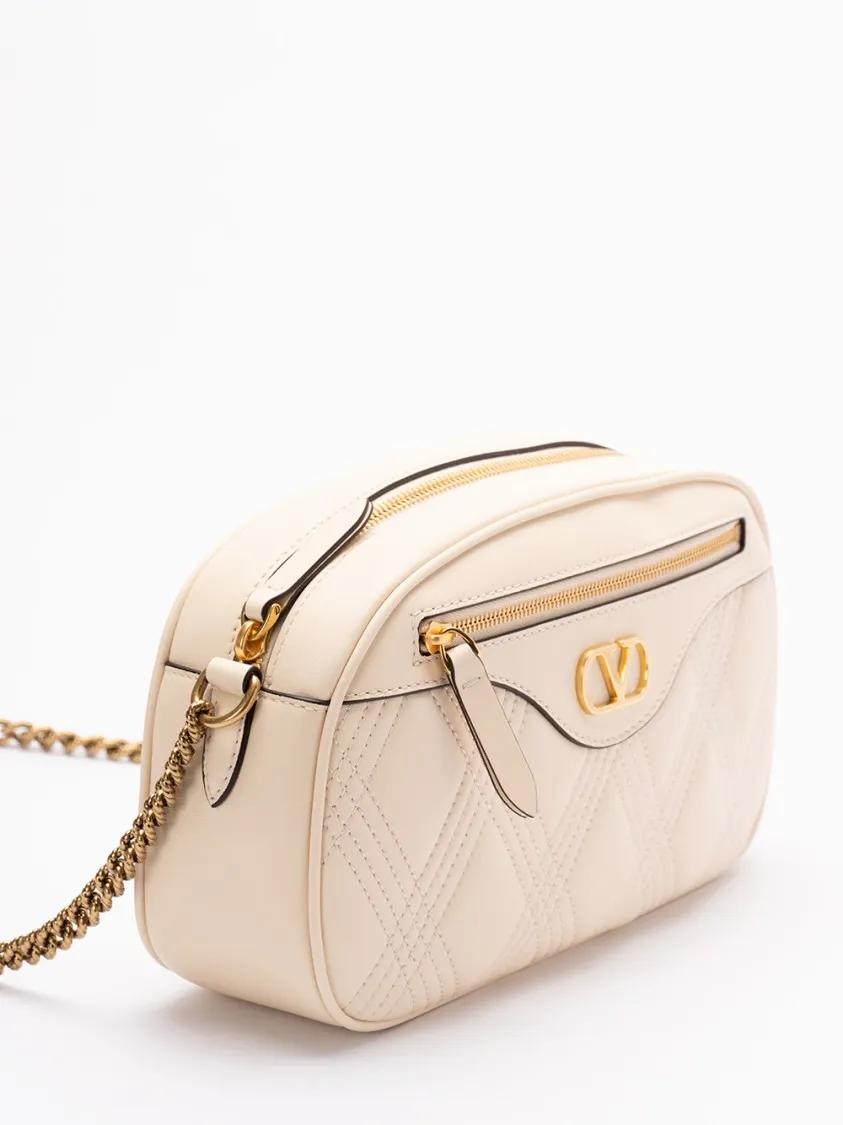 Valentino Garavani Hobo bags `Quiltie 67` Camera Case in beige