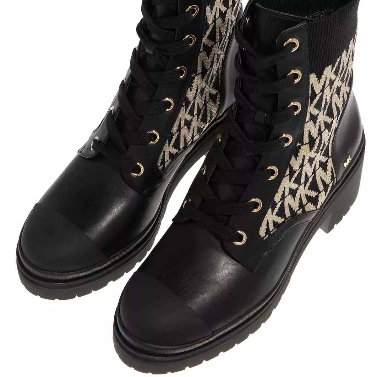 Michael kors black on sale boots with gold zipper