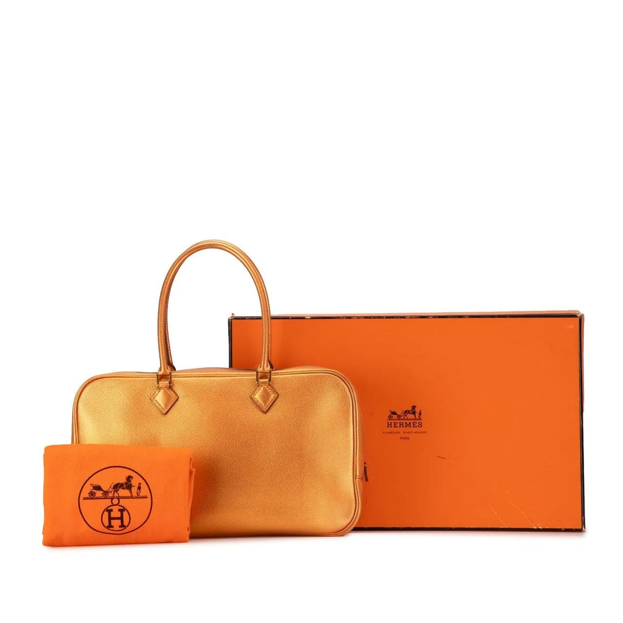 Thumbnail - Hermès Crossbody Bags - 2004 Metallic Chevre Coromandel Plume Elan 28 - Gr. unisize - in Orange - für Damen