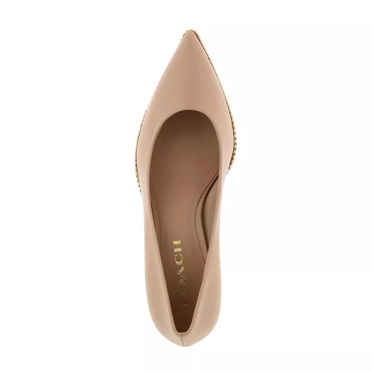 Coach store nude pumps