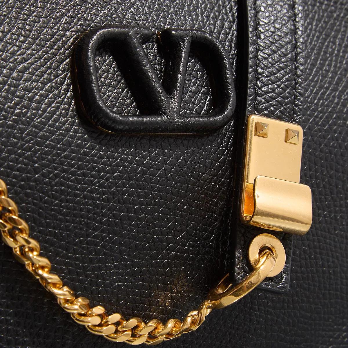 Valentino Garavani Pochettes V Logo Signature Mini Bag in zwart