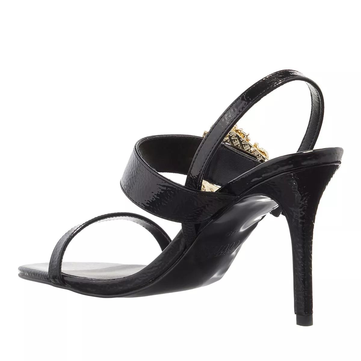 Versace black and white logo best sale strap heels