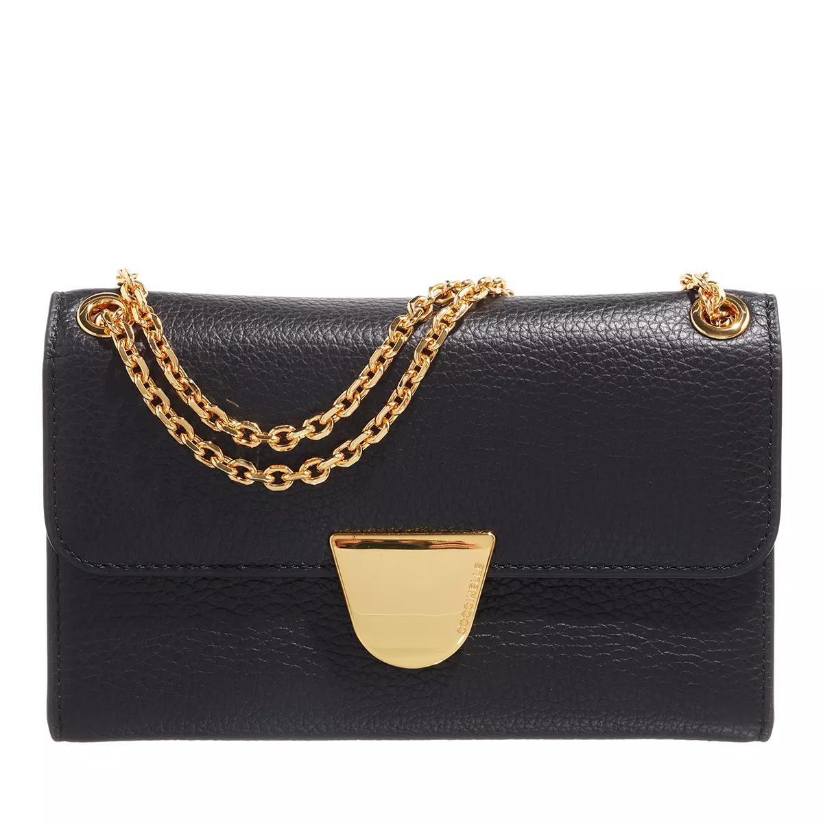 Coccinelle on sale gold bag