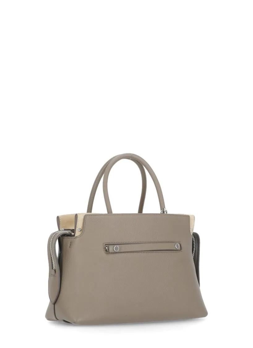 TORY BURCH Hobo bags Brown Leather "Mercher" Hand Bag in bruin