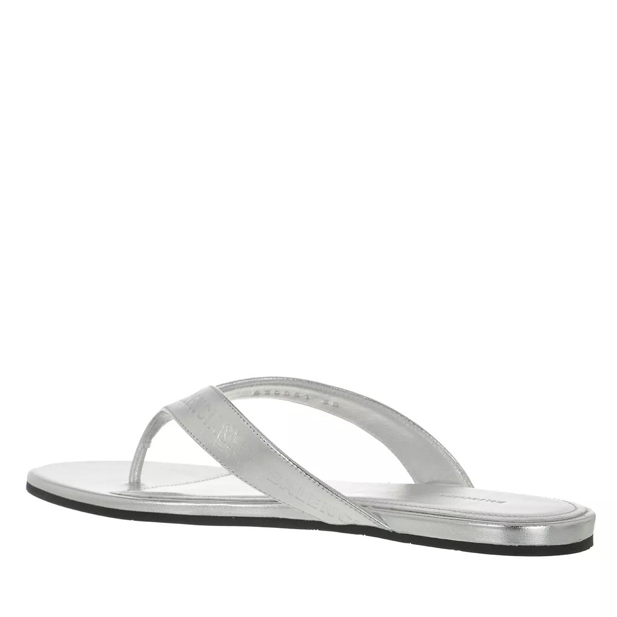 Metallic silver flip on sale flops