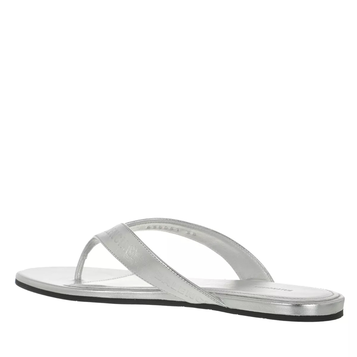 Silver leather store flip flops