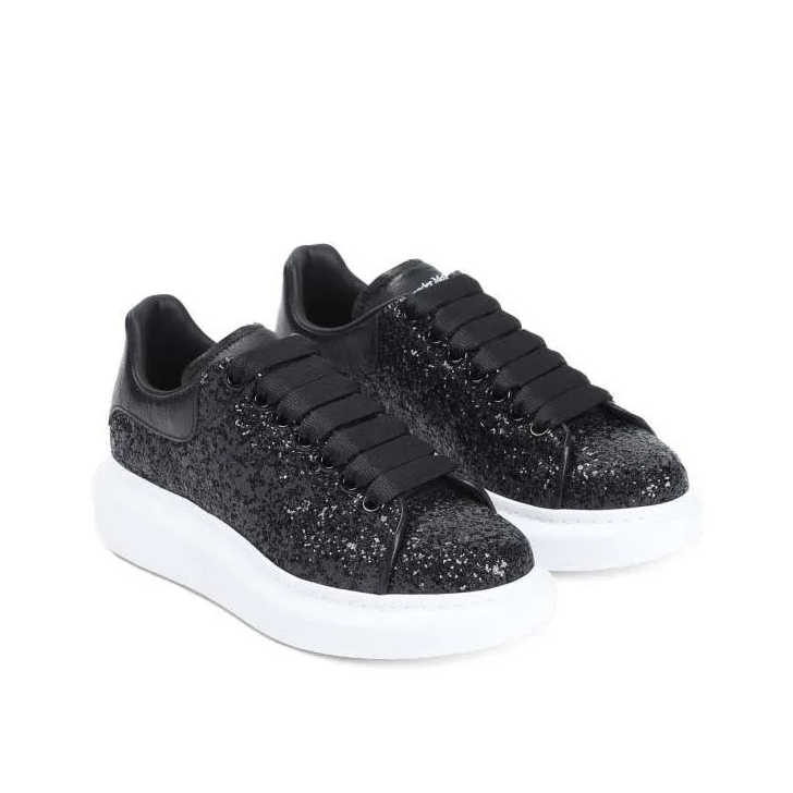 Black leather alexander mcqueen trainers on sale