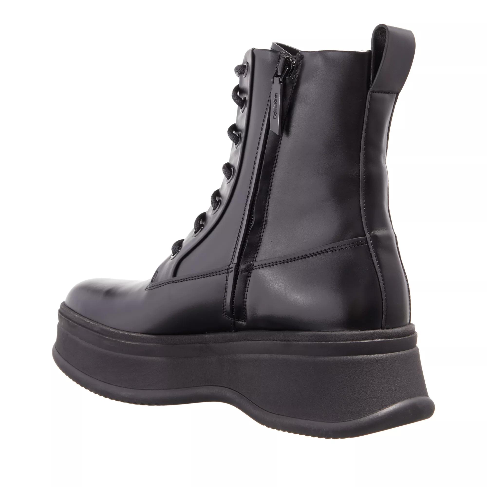 Calvin klein patent outlet boots