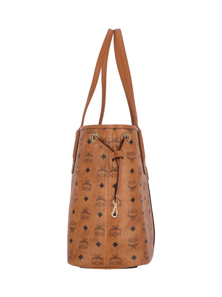 MCM Shoppers & Totes Structured Brown Bag With Distinctive Logo Pattern in bruin