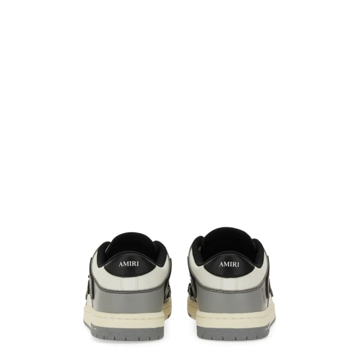 スニーカー AMIRI SS25 \"VARSITY SKEL\" SNEAKER (AMFOSR1077 BLACK) AMIRI Varsity Skel low-top sneakers for Men - Black in KSA
